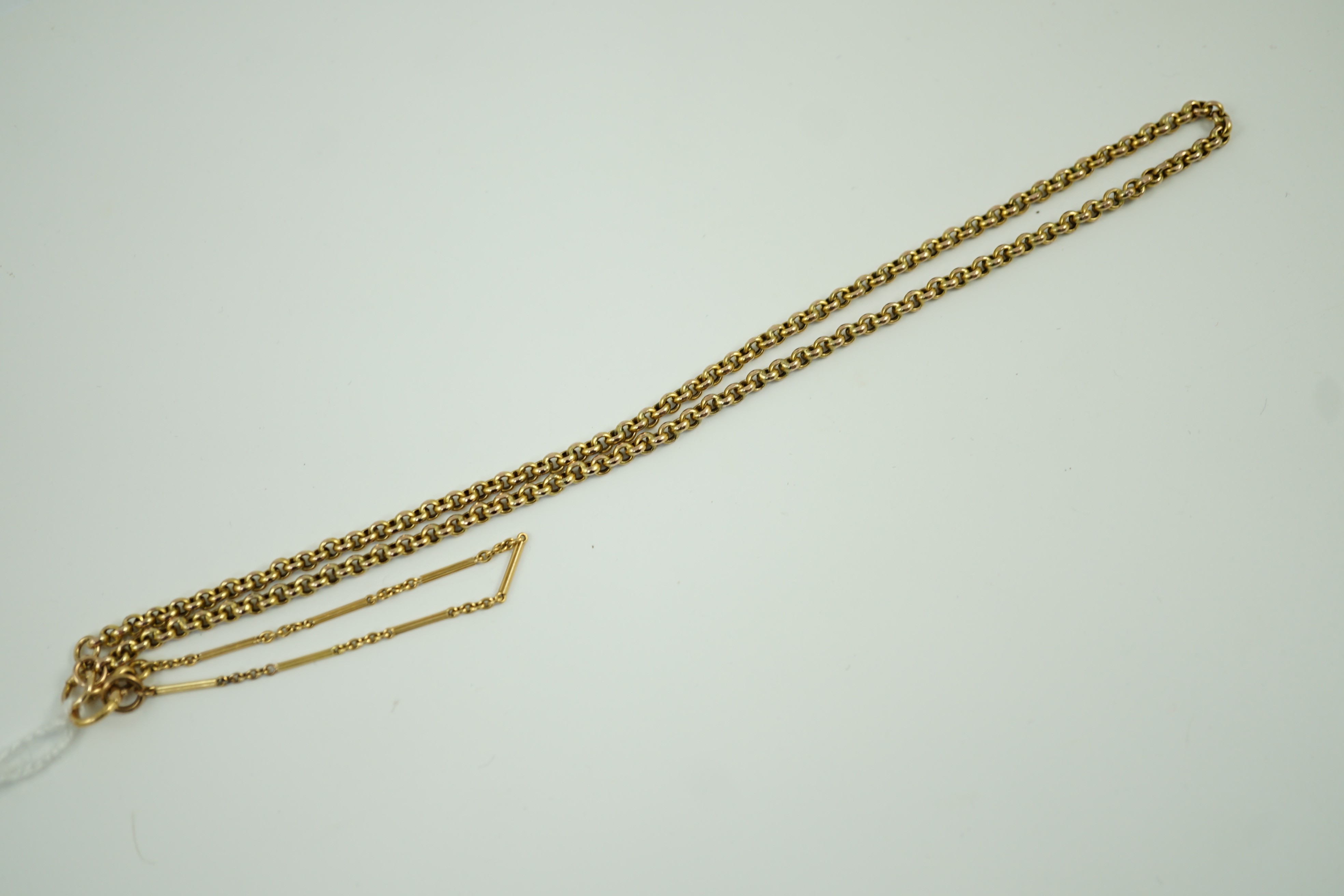 A yellow metal (stamped 56) chain, 40cm and a small yellow metal bracelet, 14cm, gross weight 10 grams.